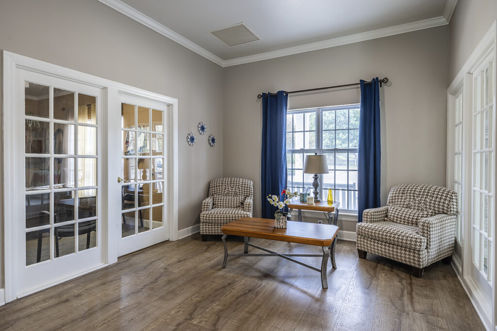 Elegant resident clubhouse interior with comfortable seating area.