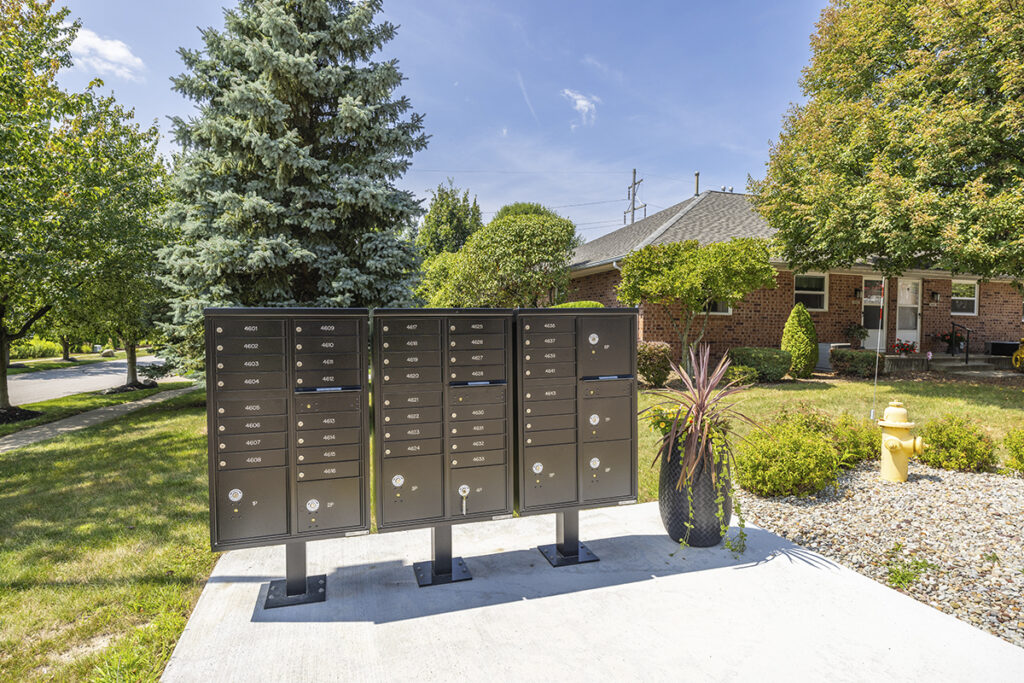 Brand new outdoor mailboxes at Idyllbrook Senior Living in Erie, PA, featuring a modern design with a newly installed concrete landing.