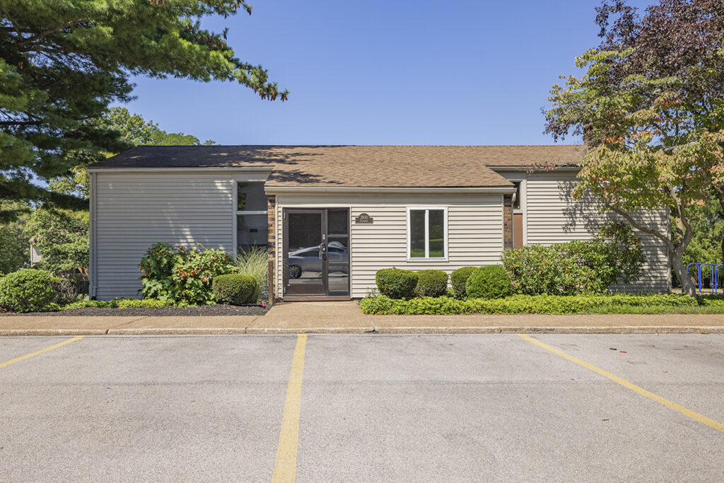 The entrance to the resident clubhouse, providing a welcoming and accessible entry point for the community's shared spaces and amenities.