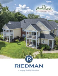 Aerial view of a multi-unit residential building with balconies, labeled "The Hammocks at Southern Hills," above the Riedman logo and tagline.