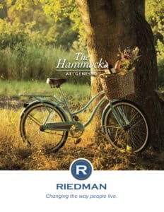 A vintage-style bicycle with a basket leans against a tree in a grassy field. The text reads "The Hammocks at Geneseo" and "Riedman: Changing the way people live.