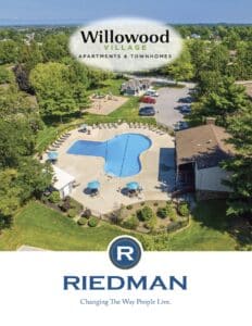 Aerial view of Willowood Village Apartments with a pool and surrounding greenery. Riedman logo and slogan at the bottom.